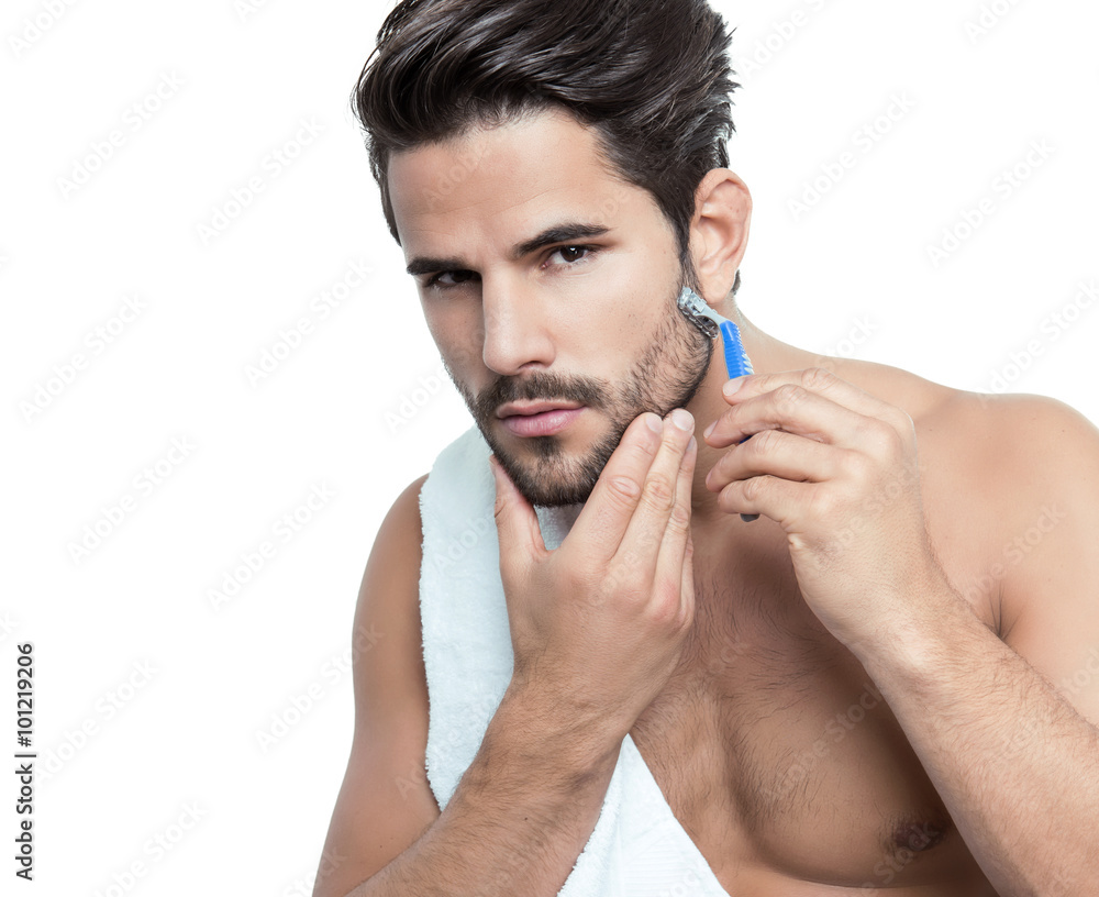 Fotografie handsome young man performing morning routine