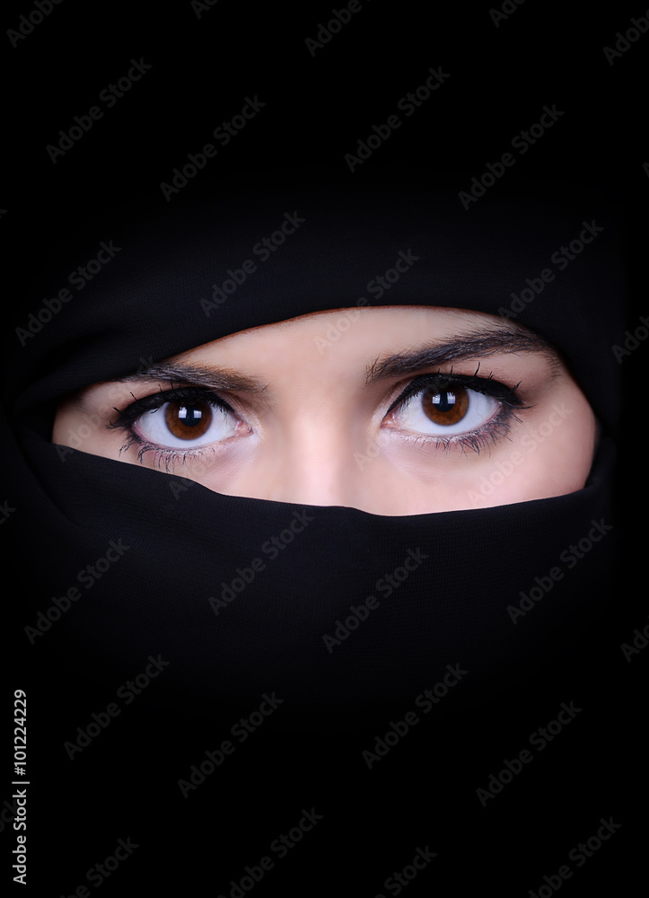 Portrait of beautiful Arab woman wearing black scarf Portrait of beautiful Arab woman wearing black scarf