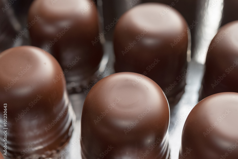 Box with chocolate marshmallow in row for sale Box with chocolate marshmallow in row for sale