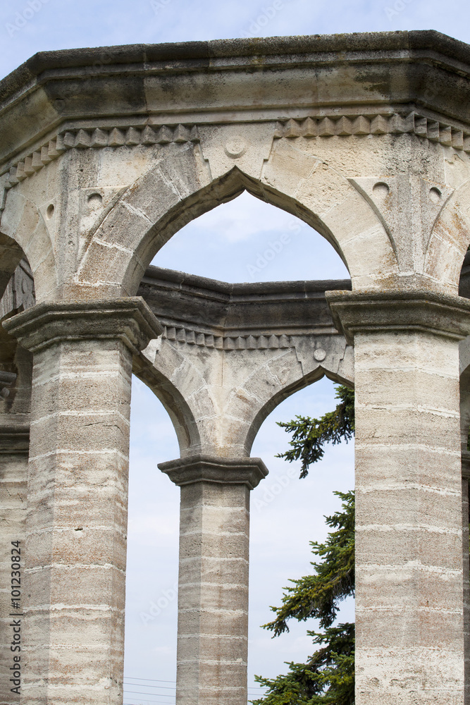 Obraz premium Architectural fragment. Arch with columns