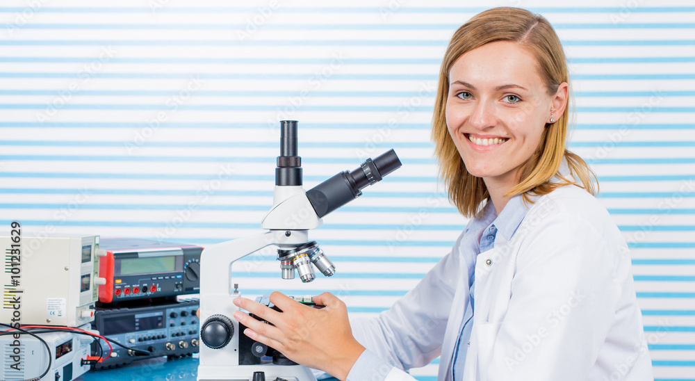 Young woman witch blonde long hair testing blood on RBC, HGB and Young woman witch blonde long hair testing blood on RBC, HGB and