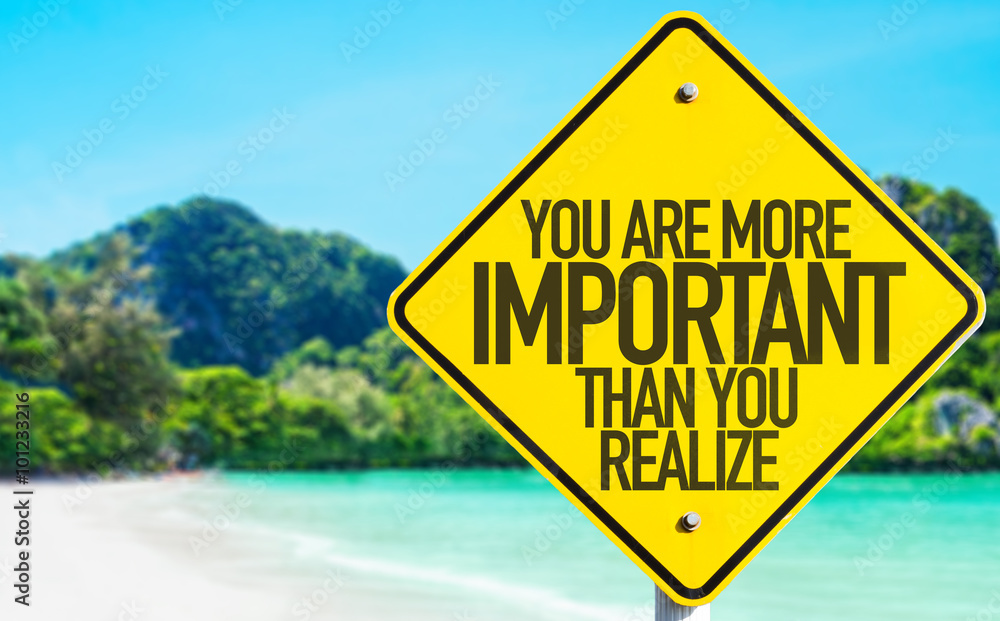 You Are More Important Than You Realize sign with beach background