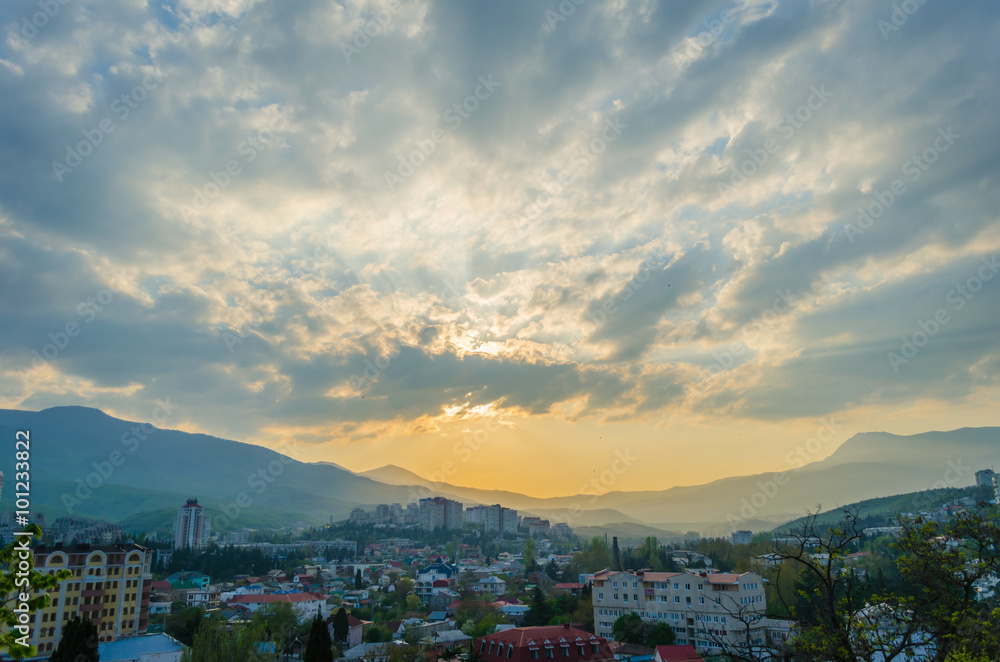 Sunset in the city of Alushta on the background.