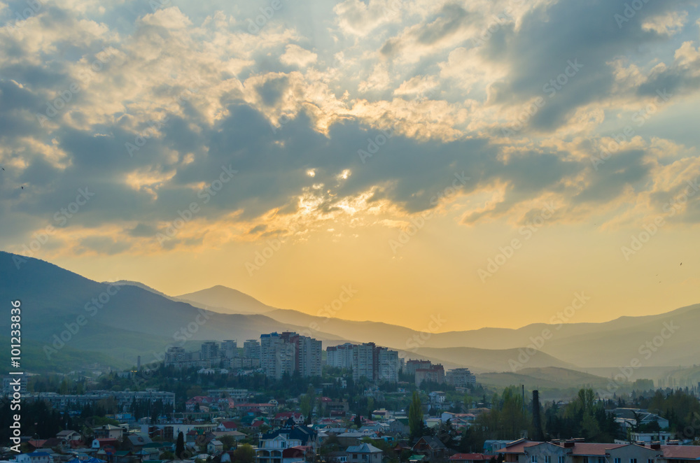 Fototapeta premium Sunset in the city of Alushta on the background.