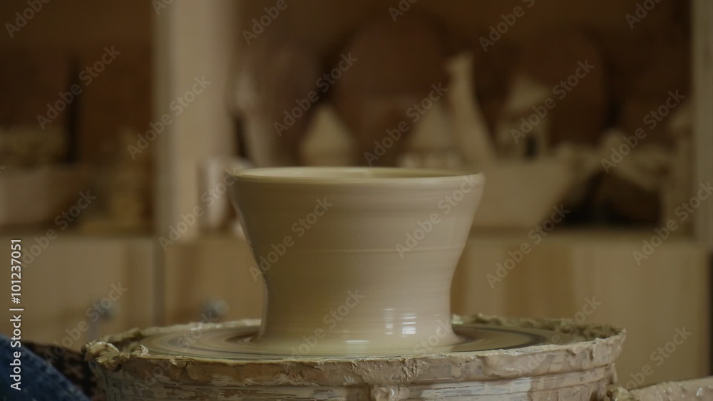 Potter Craftsman is Working on Pottery Wheel Turning the Wheel Fast Wipes the Hands Moulding a Clay Pot Making a Vessel Hands Close Up Pottery Workshop Potter Craftsman is Working on Pottery Wheel Turning the Wheel Fast Wipes the Hands Moulding a Clay Pot Making a Vessel Hands Close Up Pottery Workshop