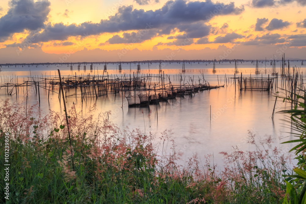 Twilight The bamboo coop for feeding fish. in south of Thailand sea. Songkhla, Koh-Yor
