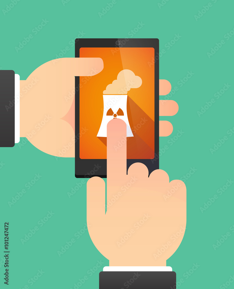 Hands using a phone showing a nuclear power station Hands using a phone showing a nuclear power station