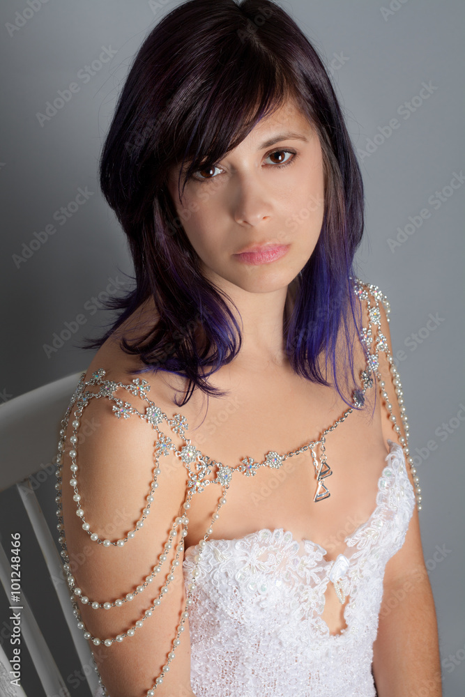 Woman in White Top and Shoulder Jewelry