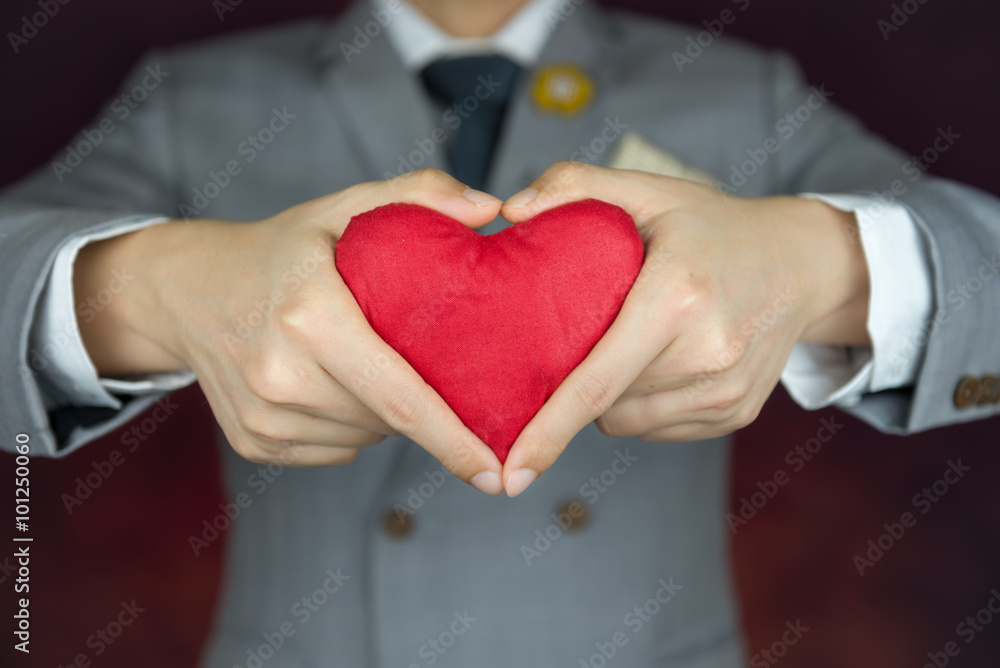 valentine's day concept,  man carries red heart