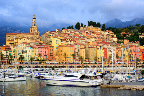 Yachts in the marina of colorful medieval town Menton on french Riviera, France