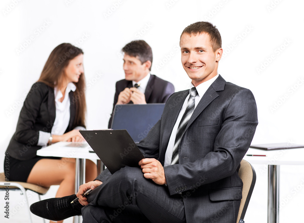 A group of businessmen discussing the policy of the company A group of businessmen discussing the policy of the company