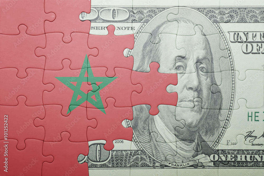 puzzle with the national flag of morocco and dollar banknote