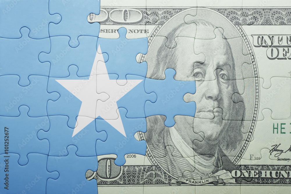 puzzle with the national flag of somalia and dollar banknote