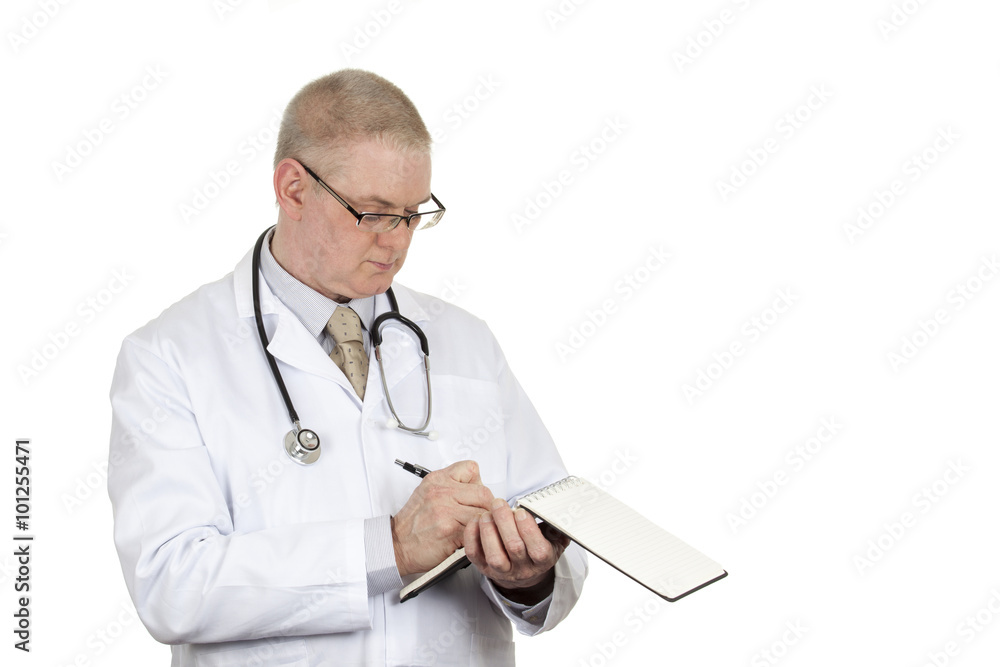 Doctor wearing glasses and stethoscope writing in his notepad isolated on a pure white background Doctor wearing glasses and stethoscope writing in his notepad isolated on a pure white background