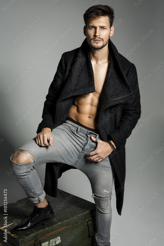 Attractive Fashion Male Model Dressed Elegant - Casual Posing Against Stock  Photo, Picture and Royalty Free Image. Image 45097578.