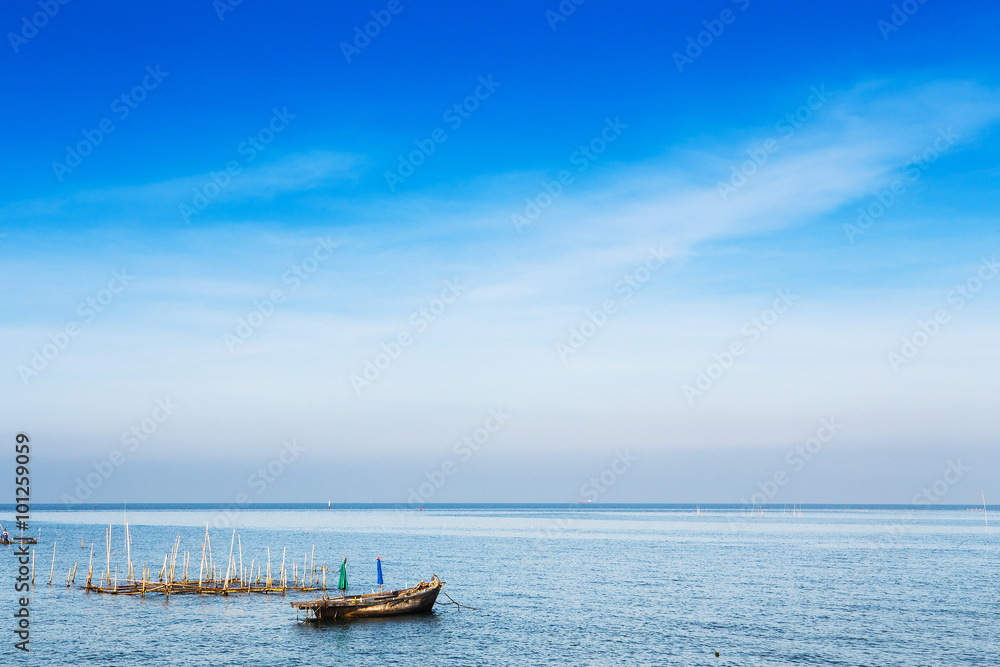 Small fishing boats in the sea.