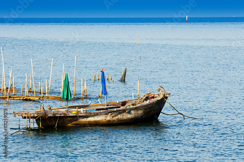 Small fishing boats in the sea.