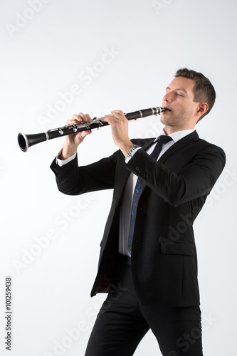 Young man playing the clarinet