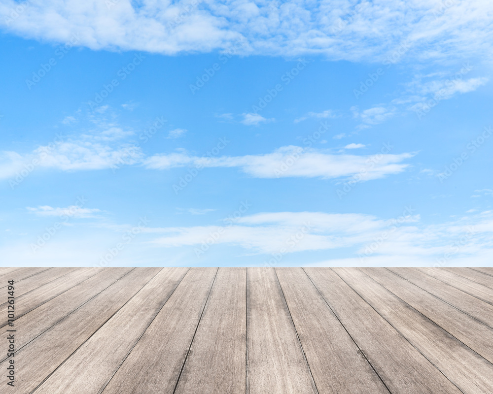 Wood table top on blue sky background  - used for display your products