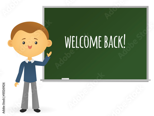 Teacher standing in front of a chalkboard saying "welcome back"