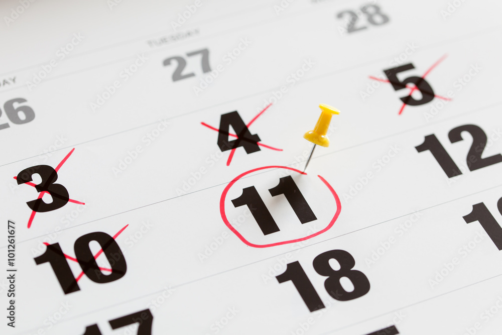 Red circle marked and pin pushed on a calendar and X Mark for counting down. concept for an important day. Red circle marked and pin pushed on a calendar and X Mark for counting down. concept for an important day.