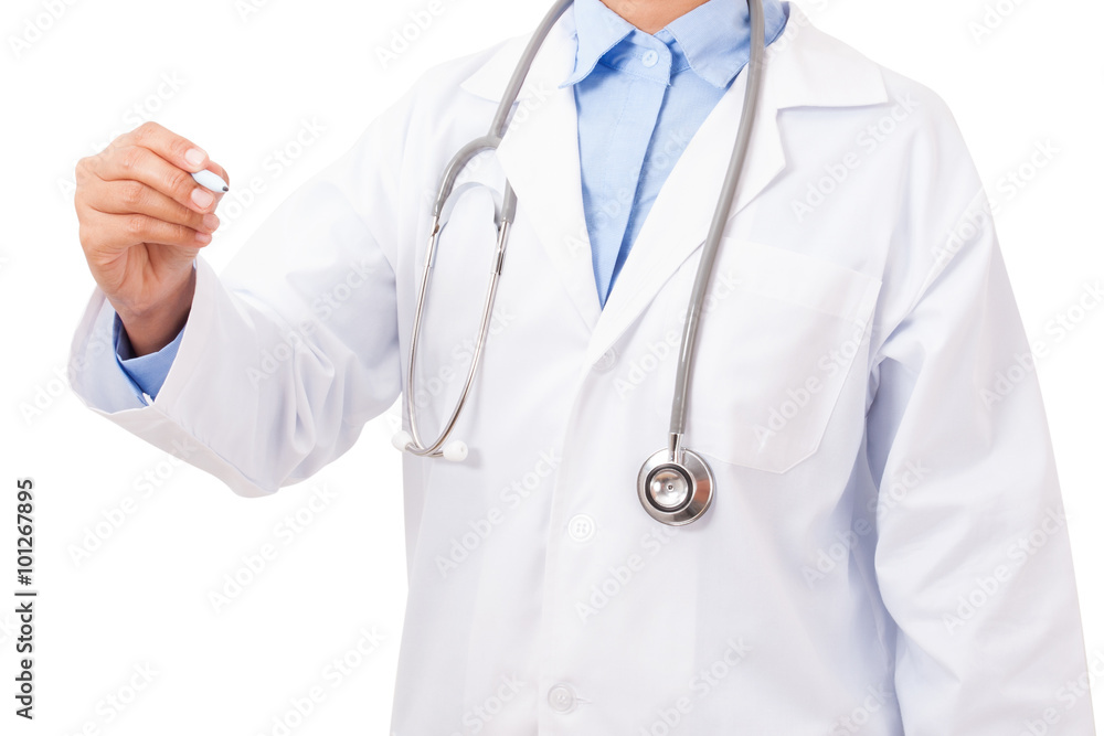 Doctor writing with pen at copyspace on white background Doctor writing with pen at copyspace on white background