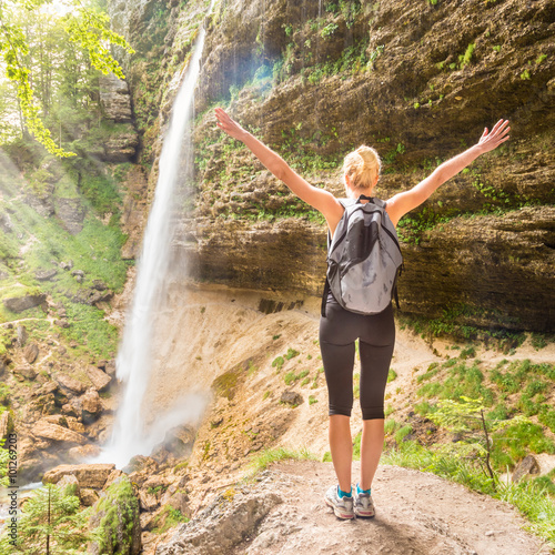 Active sporty woman relaxing in beautiful nature. photo