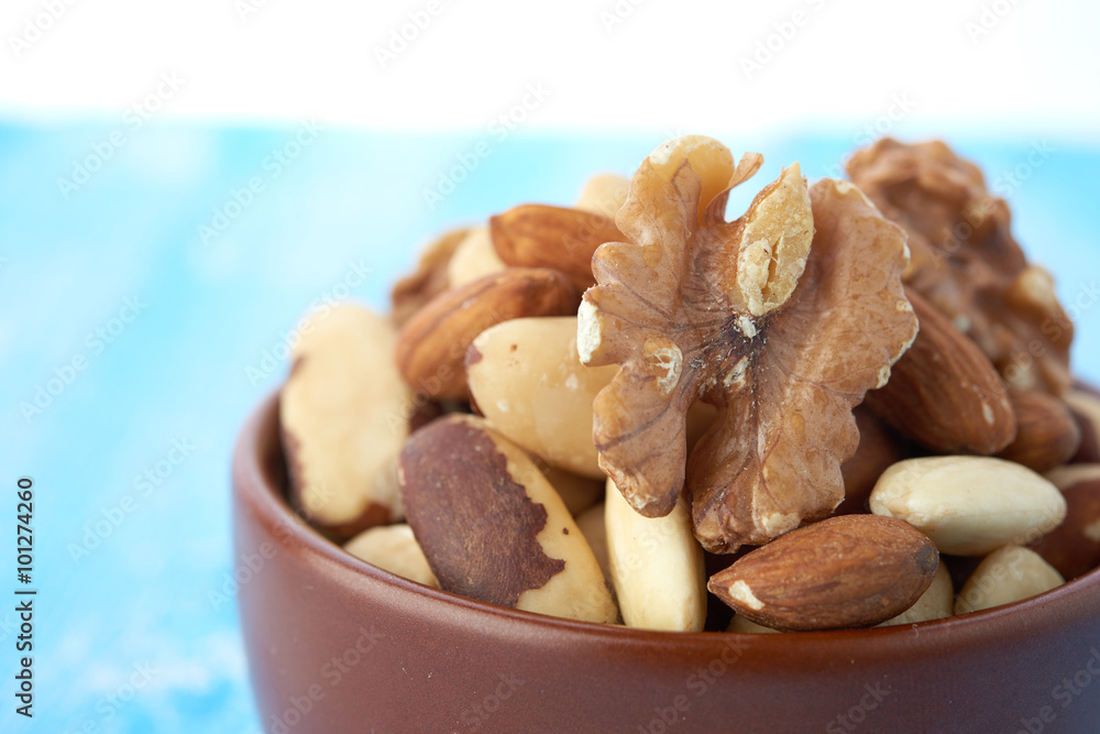 Fototapeta premium Mix nuts on wooden background