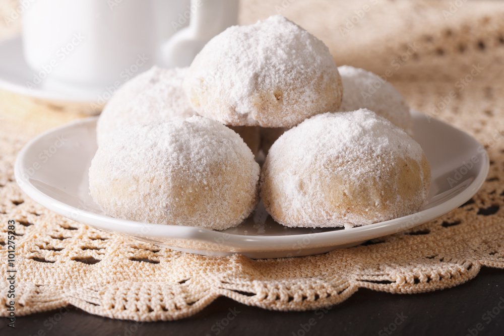 Traditional Mexican polvorón cookies macro on the table. Horizontal
