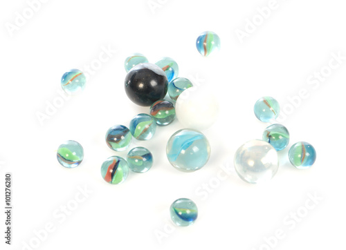 glass marbles balls on white blackground ,selective focus