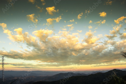 Blur landscape sunrise view on peak of mountain background