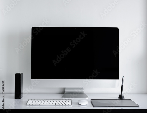Stylish workspace with computer on home photo