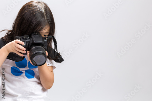 Young Girl Holding Camera