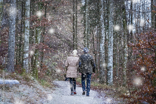 Hiking Couple on a snowing Day