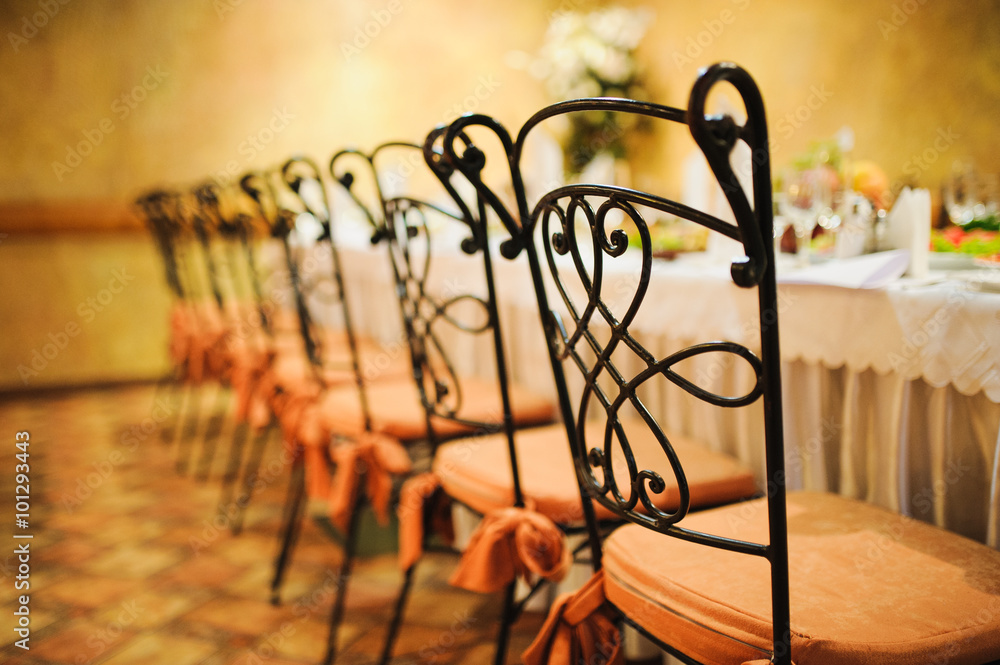 Banquet wedding chairs setting on evening reception Banquet wedding chairs setting on evening reception