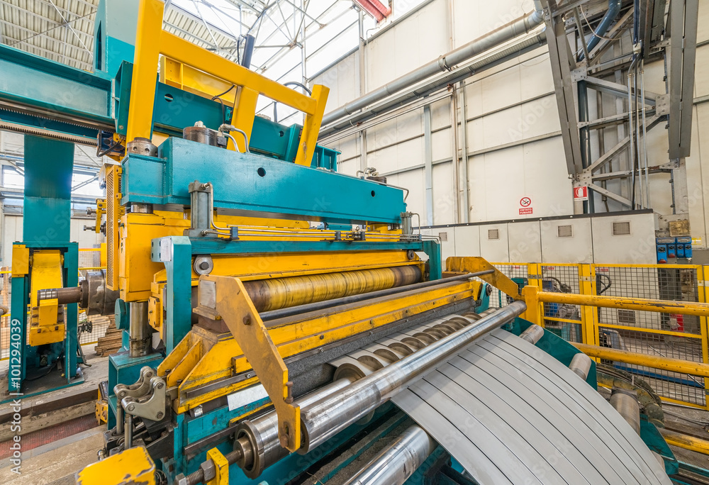 Cold rolled steel coil on decoiler of machine in metalwork manuf Cold rolled steel coil on decoiler of machine in metalwork manuf