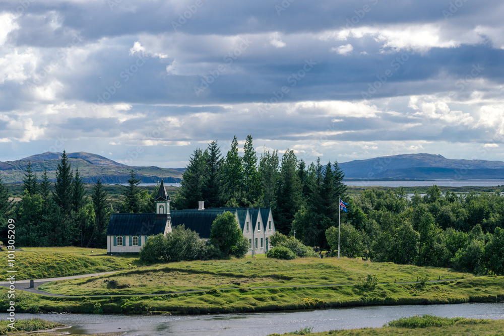 Dramatic view of famous Thingvellir with white church, Iceland.