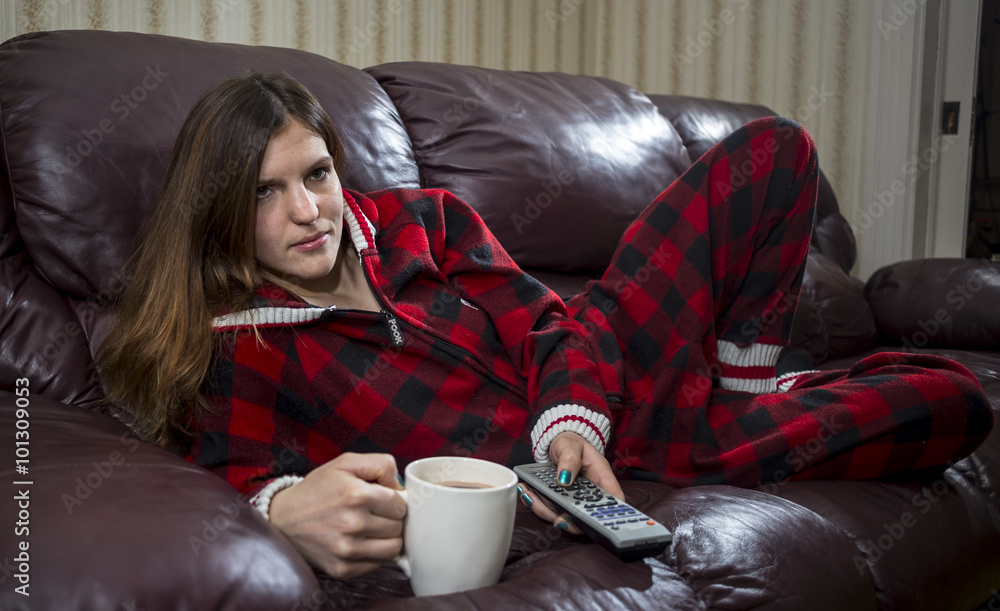 Woman in Red Plaid Onesie Pyjama Relax on Couch Stock Photo | Adobe Stock
