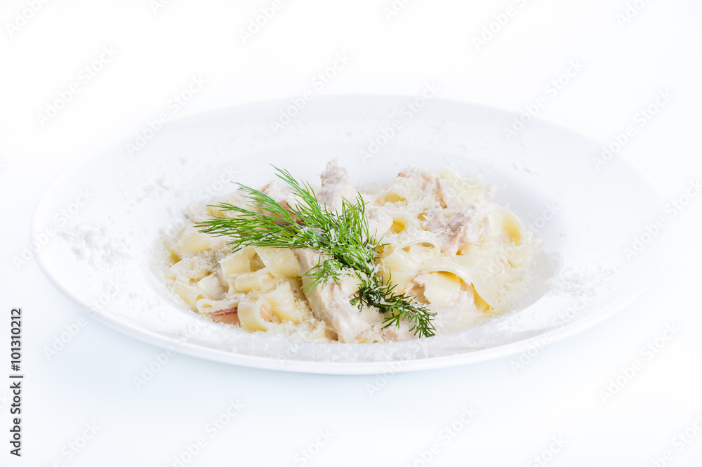 Creamy cream soup with mushrooms and croutons on a white background