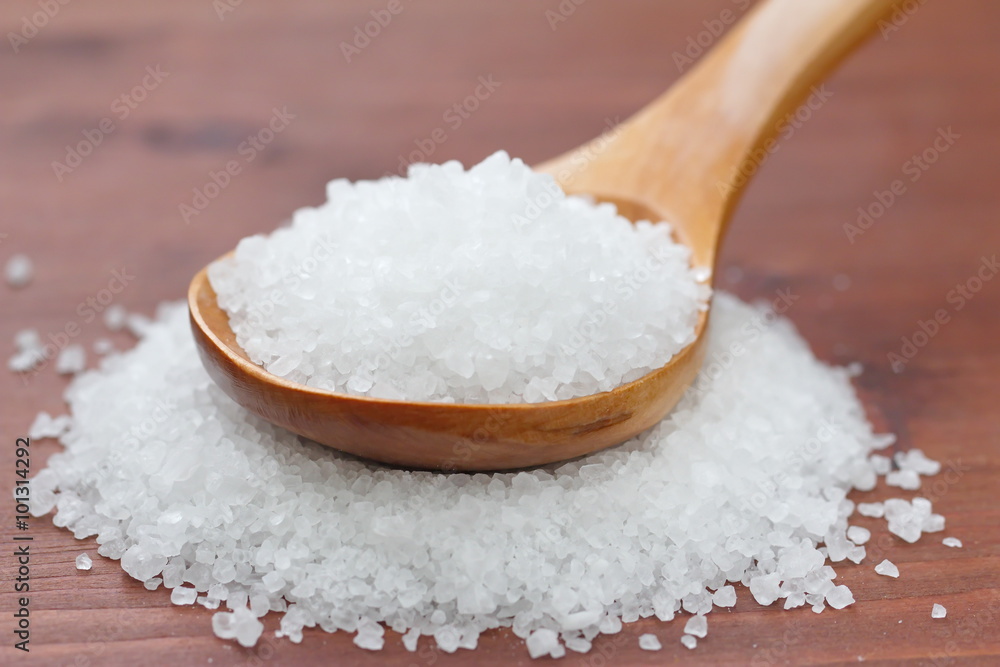 Salt in wooden spoon Salt in wooden spoon