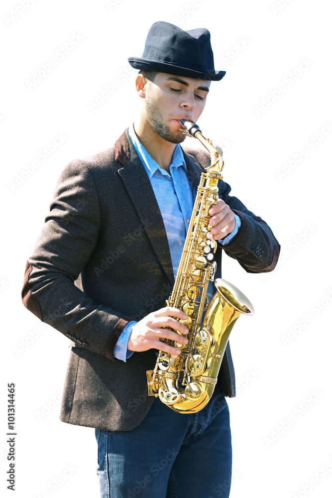 Fototapeta premium Young man playing on saxophone on the riverside