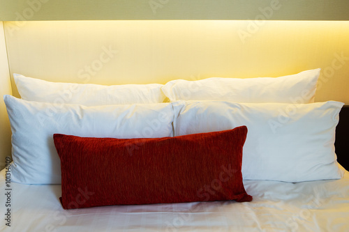 Fototapeta Naklejka Na Ścianę i Meble -  Comfortable soft pillows on the bed