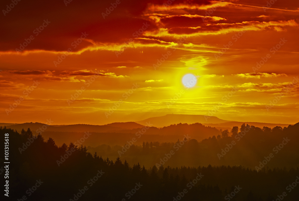 The setting sun in a landscape The setting sun in a landscape