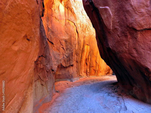 Slot canyon rock faces with illumination - landscape photo