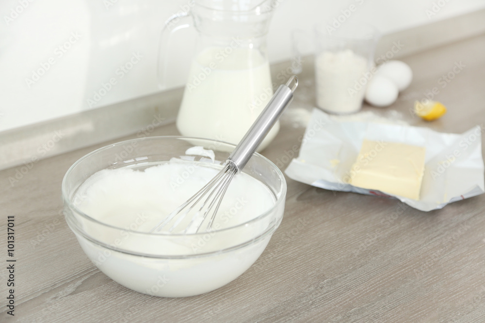 Cooking buttery cream on kitchen Cooking buttery cream on kitchen