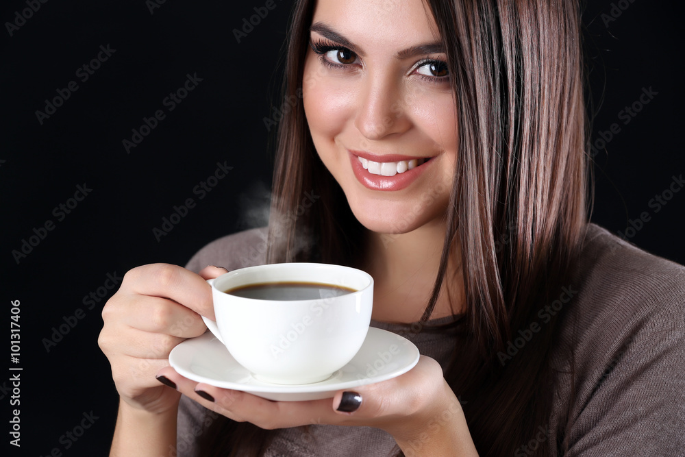 Portrait of smiling pretty woman with cup of coffee Portrait of smiling pretty woman with cup of coffee