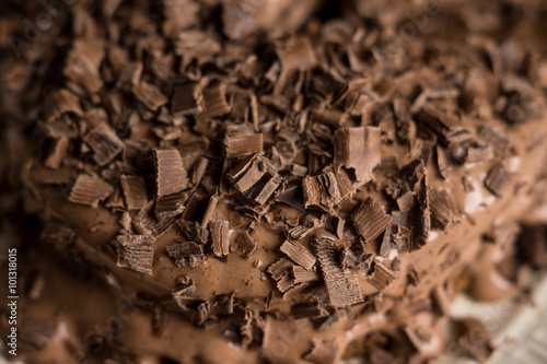 Chocolate cake on the dark rustic background. Shallow depth of field.