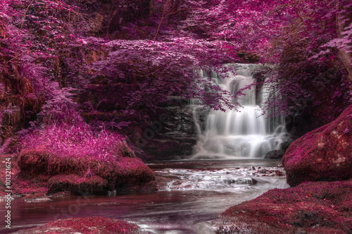 Beautiful alternate colored surreal waterfall landscape