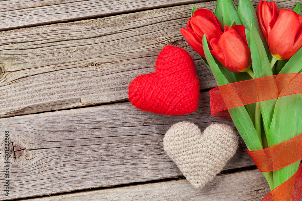 Red tulips and Valentine's day hearts Red tulips and Valentine's day hearts