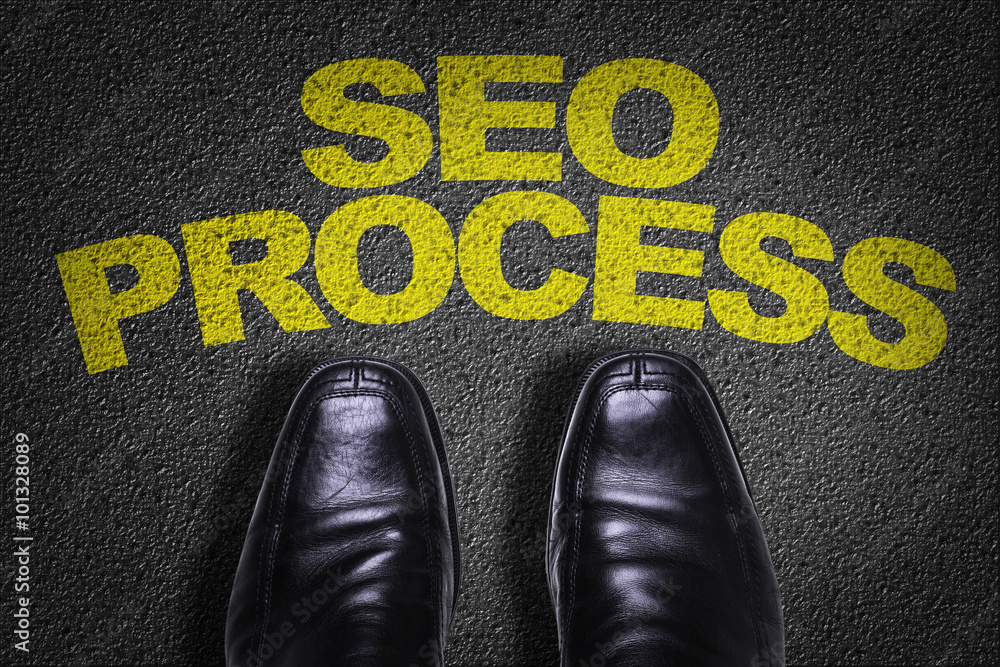 Φωτογραφία Top View of Business Shoes on the floor with the text: SEO Process
